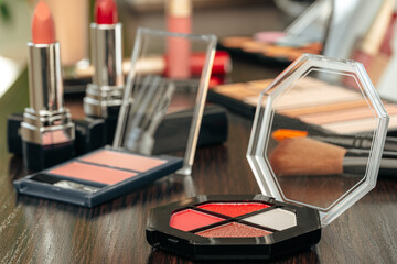 Make up products on vanity table close up