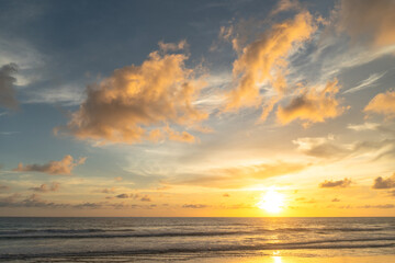 Fototapeta na wymiar Majestic sunset or sunrise landscape Amazing light of nature cloudscape sky and Clouds moving away rolling .Beautiful Phuket beach is a famous tourist destination in Andaman sea summer. .
