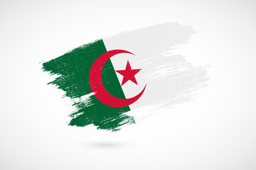 Happy independence day of Algeria with vintage style brush flag background