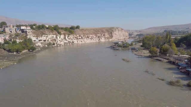 Hasankeyf, Turkey - October 2019: Remains of the town of Hasankeyf on the River Tigris, famous with stone caves after it is evacuated. The town will be sunk under water of ilisu dam