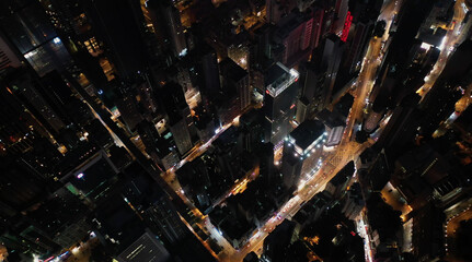 AERIAL. Top view of Hong Kong city at night time.