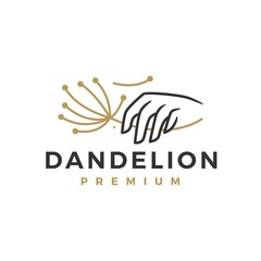 hand hold dandelion logo vector icon illustration