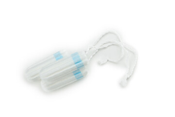 Three unused tampons isolated on white background