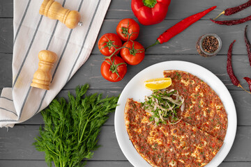 Baked homemade flatbread on wooden background close up