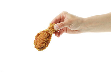 Female hand holds fried chicken, isolated on white background