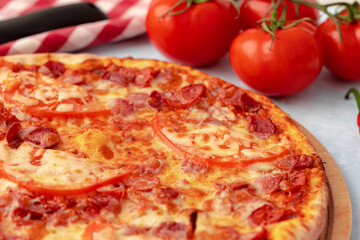 Freshly baked pizza on table close up