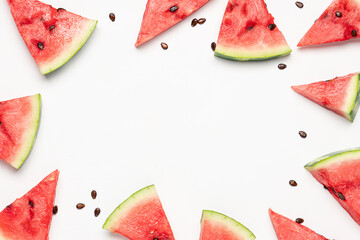 Slices of ripe watermelon on white background. Top view, copy space