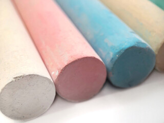 Close-up texture of chalk for drawing multicolored white, pink, blue, yellow, green