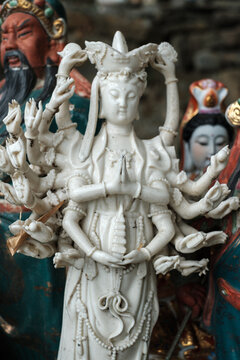 Abandoned ceramic statue photographed in Wah Kwai shrine in Aberdeen, Southern Hong Kong. In the old days, people didn't want to throw away the statues they'd had at and so the shrine was born.