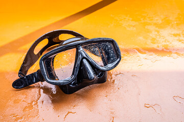 Snorkeling mask equipment on a seat.