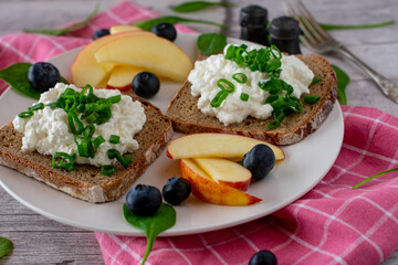 rye bread sandwich with cottage cheese and fruits