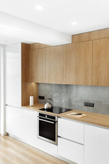 Minimalist stylish scandinavian kitchen furniture. Three color combination wood, glossy white and...