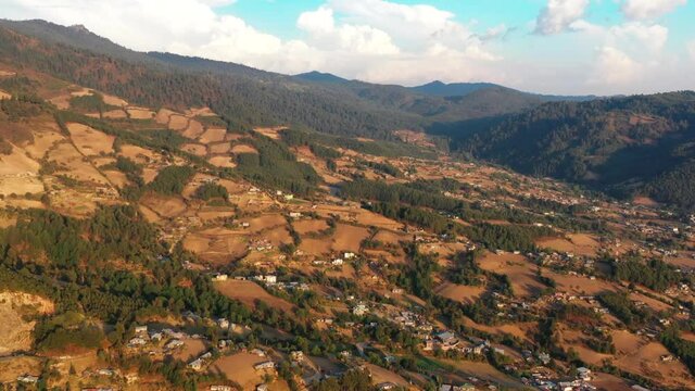 Drone Aerial Footage of mountains of El Rosario, Michoacan, Mexico during sunset