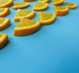 orange slices on a blue background. summer
