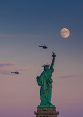 statue of liberty at Moonrise