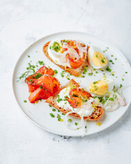 Gravlax, eggs and pickled onion sandwich