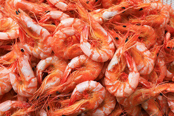 Dried prawns pile up in the seafood market