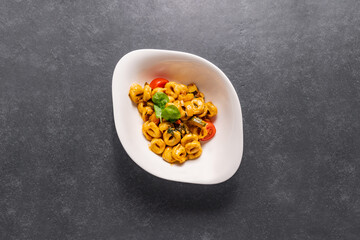 tagliatelle with tomatoes and mushrooms