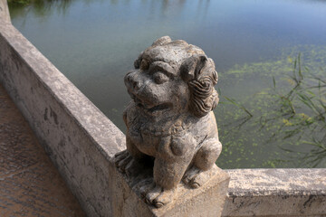 Fototapeta na wymiar Lion carved on stone bridge, North China