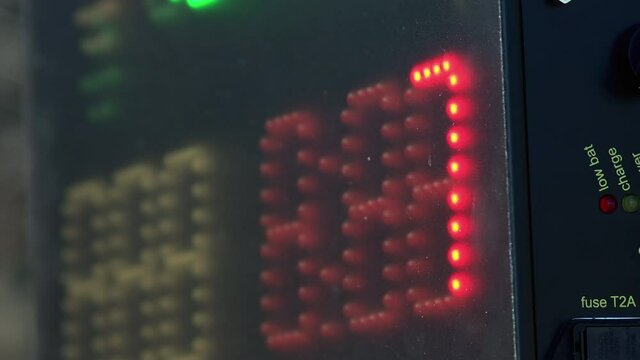 Sports car race countdown digital timer, stopwatch at the finish of the race. Closeup