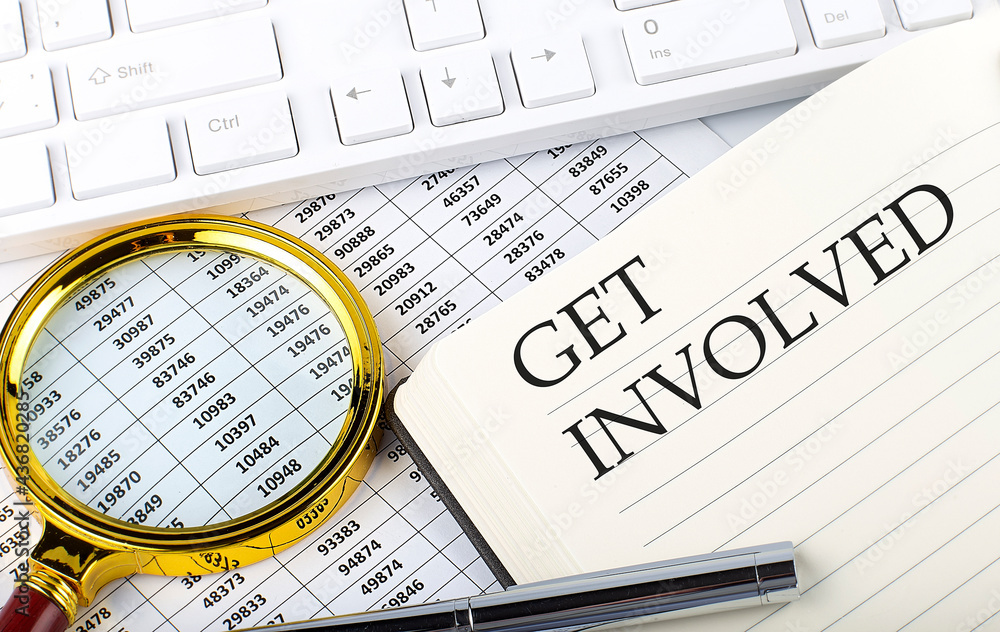 Poster get involved text on notebook with chart, magnifier,keyboard and pen