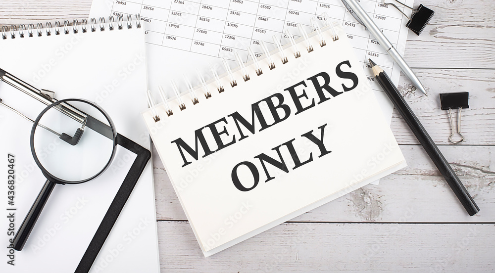Aufkleber members only . text written on notepad with office tools and documents.