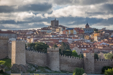 Fototapeta na wymiar Majestic panoramic view of Ávila city Walls & fortress, full around view at the medieval historic city