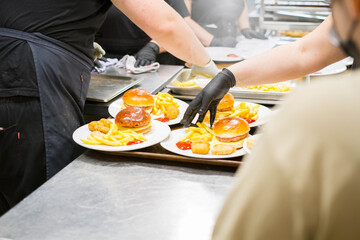 Elaboration of design dishes. Scenes of real teamwork by great Spanish professionals of gourmet haute cuisine for social events