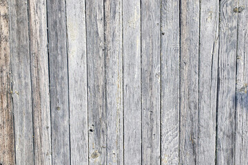 Old wooden fence. Aged texture, material. Beautiful background.