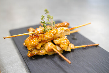 Elaboration of design dishes. Scenes of real teamwork by great Spanish professionals of gourmet haute cuisine for social events