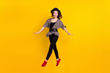 Fototapeta na wymiar Full body photo of attractive young happy lady jump up smile good mood isolated on yellow color background