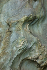 Fototapeta na wymiar バックグラウンド背景、自然石の彫像のような紋様が面白い