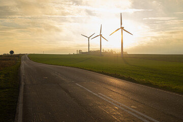 Wind turbines at sunset