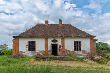 Fototapeta na wymiar Old Serbian traditional house. Abandoned houses in Serbia used by people to show how they once lived, mostly in the 20th century.