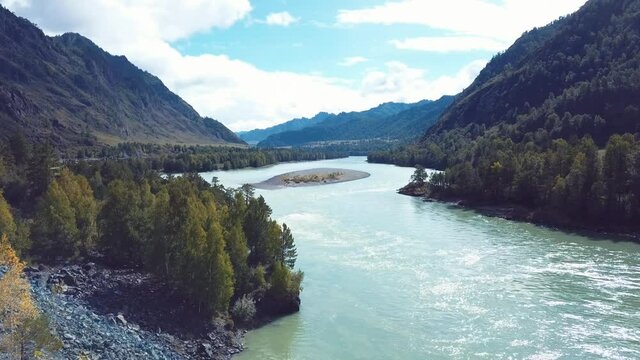 4K Aerial Footage Video of the Autumn Landscapes and Mountain River on the Chemal Tract in the Altai Mountains, Russia