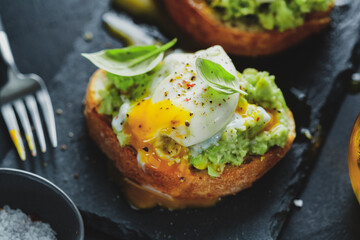Tasty fresh toast with avocado and egg