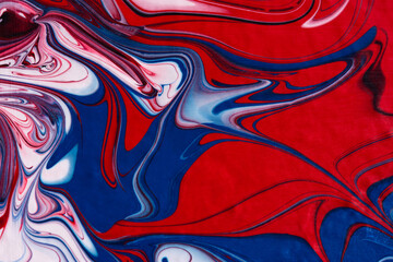 Abstract painting modern background. Red, black, blue shiny fluid art. Artistic bright futuristic background. Dynamic lines, water movement, splash. Design of holiday cards, covers. Christmas Colors