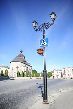 pedestrian crossing sign on a lamppost