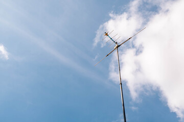 Television panel, on the sky background and white clouds.