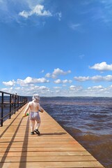 the child plays plays walks in nature summer 