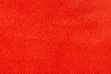 Orange carpet texture with long fibers close-up