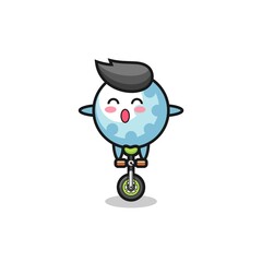 The cute golf character is riding a circus bike