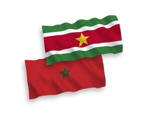 Flags of Republic of Suriname and Morocco on a white background