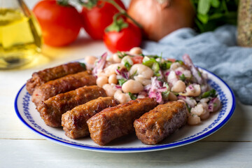 Turkish Tekirdag or inegol Kofte with Piyaz Salad