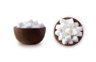 Sugar cube isolated on white. Selective focus. Sugar cube in wooden bowl on white background. Heap of sugar with copy space for text.  Top view.