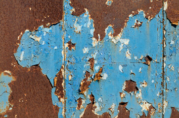 Old rusty surface. Rusty metal. Old peeling paint. Iron structure. Steel sheet.