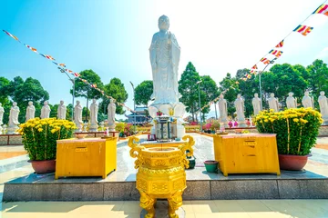 Poster Vung Tau, Vietnam - February 24th, 2021: Architecture presbytery temple Dai Tong Lam moring sunshine, which attracts tourists to visit spiritually and pray Buddha in Vung Tau, Vietnam © huythoai