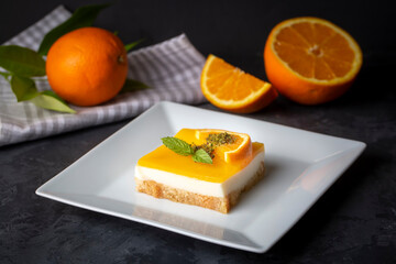 Naklejka na ściany i meble A delicious Turkish dessert; Etimek dessert with orange, orange cake, orange milk cake (Turkish name; Portakalli etimek tatlisi)