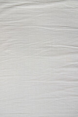 Fototapeta na wymiar White fabric texture. Clothes background. Close up