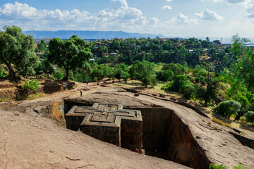 Main View to the Church of Saint George, one of many churches hewn into the rocky hills of...